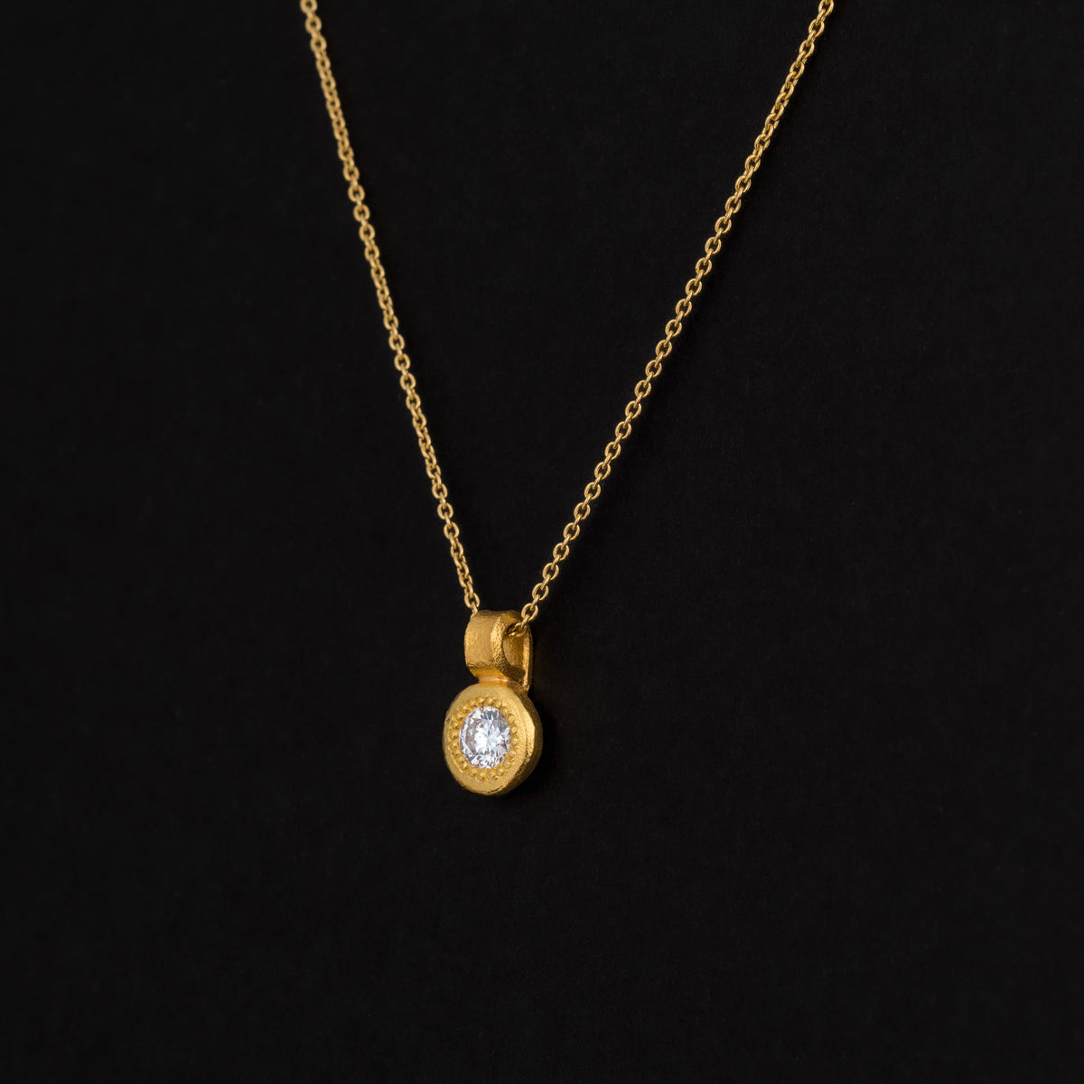 0.17CT Diamond on 22K gold pendant