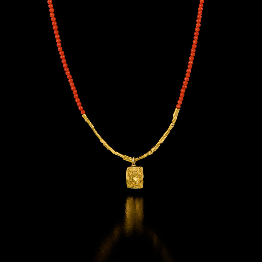 Coral Necklace with a Gold Pendant