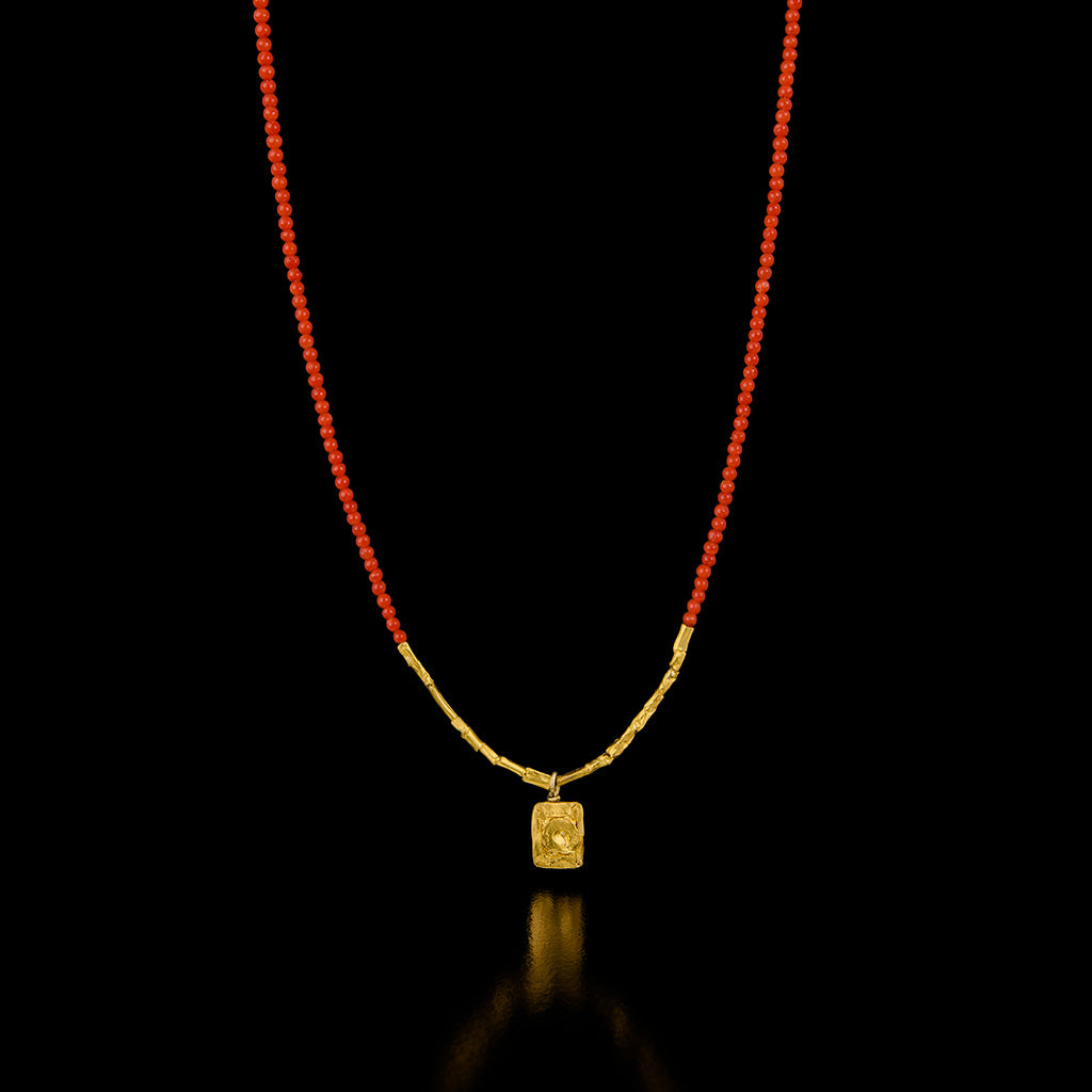 Coral Necklace with a Gold Pendant