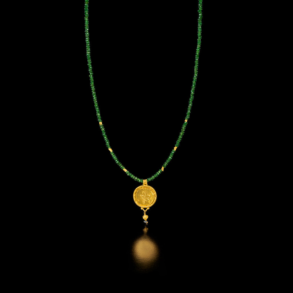 Tsavorite Necklace with a Gold Circle Pendant