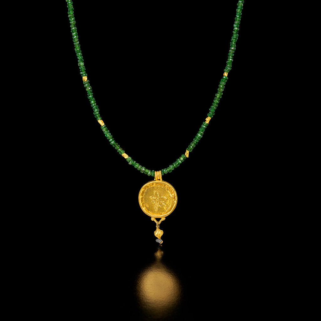 Tsavorite Necklace with a Gold Circle Pendant